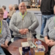 The 5 members of the winning Quiz Night team with big smiles and first place medallions