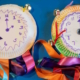 Paper plates with hand-drawn clock faces and colourful ribbons