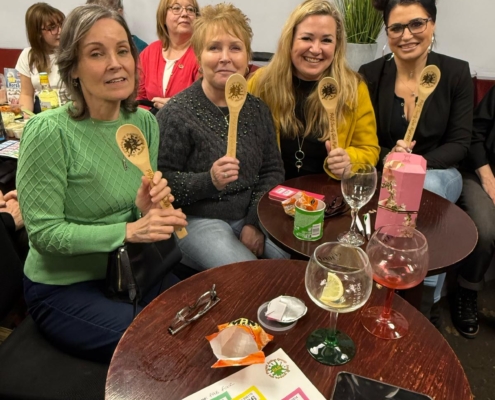 The team which came last gets a wooden spoon each but they're still smiling