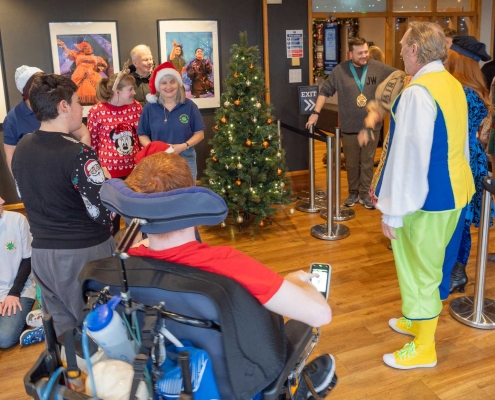 Panto stars come out to meet the child Panto stars come out to meet the child