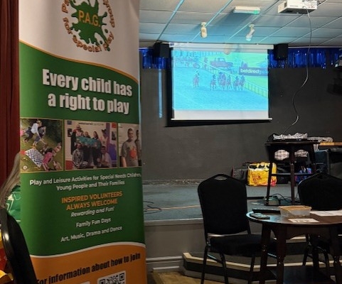 PAG banner at our fundraising night - virtual horseracing