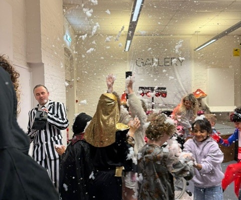 Halloween party fun with a foam shower